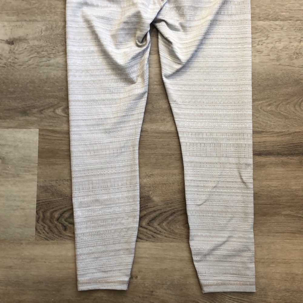 Athleta Leggings In a tan and white textured pattern. - Picture 13 of 13
